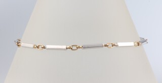 A yellow and white metal 9ct bracelet 18cm, 3.5 grams 