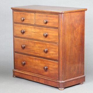 A Victorian mahogany D shaped chest of 2 short and 3 long drawers with turned handles 104cm h x 103cm w x 51cm d 