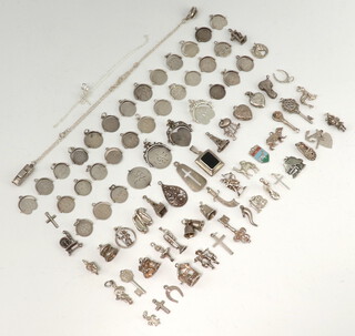 A quantity of silver charms 151 grams