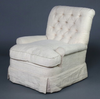 A Howard style armchair upholstered in white buttoned material 82cm x 81cm w x 71cm d (seat 33cm x 40cm) 