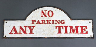 An arch shaped cast iron sign "No parking at any time" 18cm x 48cm 