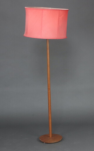 A teak standard lamp 134cm 