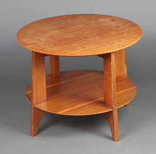 A 1950's circular 2 tier mahogany occasional table 51cm h x 66cm diam. (slight water and contact marks in places)