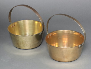 Two 19th Century brass preserving pans with swing handles 14cm x 30cm diam. 