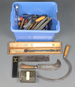 A quantity of handyman tools contained in a blue plastic box 