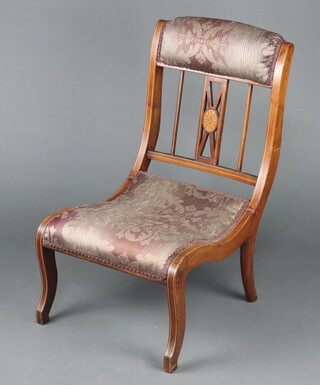 An Edwardian inlaid mahogany nursing chair with upholstered seat and back 76cm h x 46cm w x 49cm d (old bracket repair to leg) 