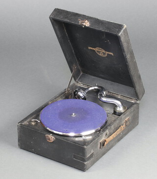 A Columbia portable manual gramophone together with a collection of records 