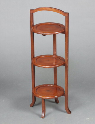 An Edwardian circular mahogany 3 tier cake stand 79cm h x 28cm diam. 