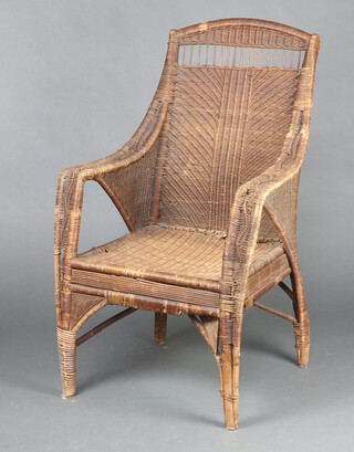 A bamboo and wicker open arm chair