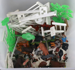 A collection of Britains plastic farmyard figures, fencing, etc 