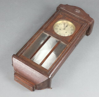 A 1930's striking wall clock with silvered dial, contained in an oak case 79cm h 