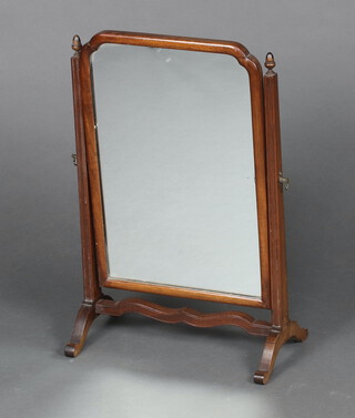 A Queen Anne style arched plate mirror contained a walnut frame 58cm x 38cm x 20cm 