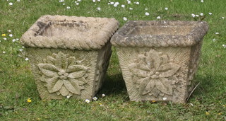 A pair of square tapered well weathered garden urns with rope edge and floral decoration 26cm h x 30cm w x 29cm d 