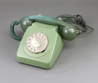 A 1970's green dial plastic telephone the base marked 746 GNA 