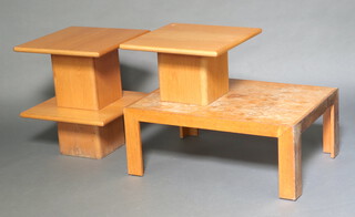 A rectangular oak coffee table on square supports 40cm h x 100cm w x 72cm d and 3 square coffee tables/pedestals 30cm h x 59cm w x 5cm d (some water and contact marks in places) 