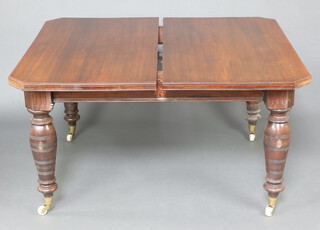 A Victorian mahogany extending dining table raised on turned supports with 2 extra leaves, complete with winder 70cm h x 122cm x 134cm (top is loose)  