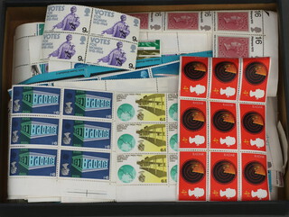 A quantity of Elizabeth II GB mint stamps (contained in a Kodak paper box) 