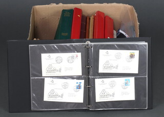 Two albums of GB first day covers etc, all contained in a cardboard box 