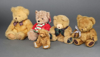 A Harrods 2010 teddy bear together with 3 others 