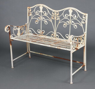 A folding wrought metal bench 89cm h x 104cm w x 53cm d (some rust)  