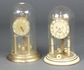 Two 400 day clocks with  domes and a gilt table lamp