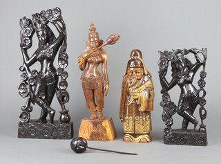 A carved wood figure of a Chinese immortal 30cm and 3 carved wood figures 