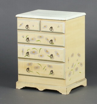 A yellow and floral painted table top chest of 2 short and 3 long drawers on bracket feet 44cm h x 33cm w x 26cm d 