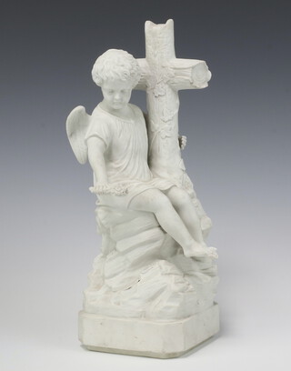 A French Parian figure of an angel seated by a cross 32cm  x 13cm x 12cm (one wing is damaged) 