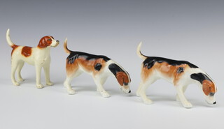 A Sylvac pottery figure of a hound 14cm, 2 others 14cm 