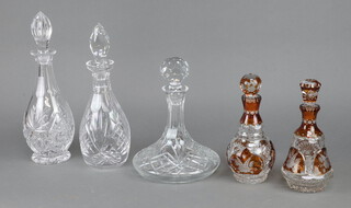 A pair of Bohemian coloured glass decanters 24cm and 3 others 