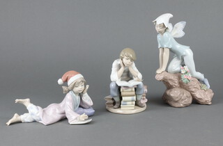 Three Lladro figures - Tinker Bell 25cm, boy reading a book and a girl lying on a pillow 