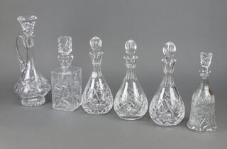 A pair of mallet shaped decanters and stoppers 28cm, 3 others and a ewer 