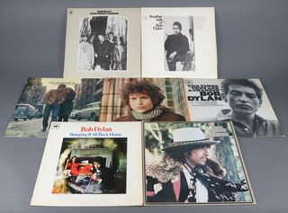 Seven Bob Dylan records - The Freewheelin', Brink It All Back Home, Another Side of Bob Dylan, Desire, The Times They Are A-Changin', Bob Dylan and John Wesley Harding and Blonde on Blonde 