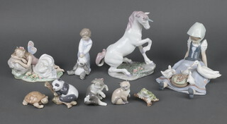 A Lladro figure of a Unicorn 7697 22cm ditto of a girl with geese 5074 17cm, 2 other figures and 5 animals 