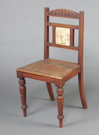 A Victorian bleached mahogany bar back hall chair with inlaid tile, 85cm h x 44cm w x 37cm d (sun bleached, split to seat, small section of timber missing to edge of seat) 