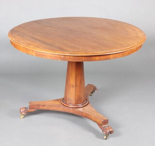 A William IV circular mahogany snap top breakfast table raised on chamfered column, triform base and scroll feet 73cm h x 106cm diam. (contact marks in places)