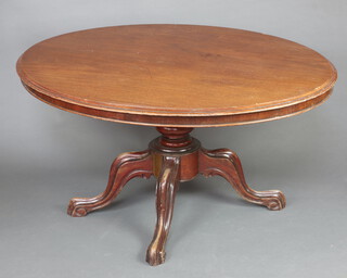 A Victorian oval Loo table, raised on a turned column and tripod base (contact marks in places)