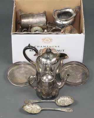 A pair of silver plated bottle coasters, a hotel ware plated teapot, sugar bowl and hot water jug, together with other minor items of plated ware 