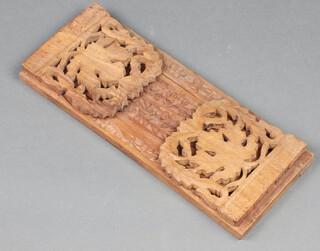 A Burmese carved hardwood book slide 12cm x 33cm 