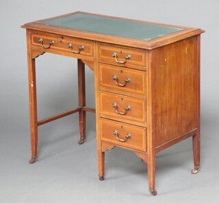 An Edwardian inlaid and crossbanded mahogany  desk with inset glass panel fitted 1 long and 4 short drawers, raised on square tapered supports 80cm h x 88cm w x 48cm d (top has 2 splits, contact marks throughout) 