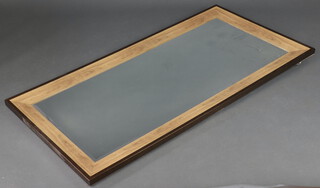 A rectangular bevelled plate wall mirror contained in a wood grain effect frame 163cm x 80cm  (as new) 