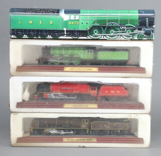 A Flying Scotsman Locomotive tin together with 3 model locomotives - LNER Flying Scotsman, Duchess LMS and Pacific Chapelon Nord 