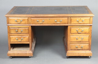 A late 19th/early 20th Century mahogany pedestal desk with blue inset writing surface above 1 long and 6 drawers 80cm h x 152cm w x 90cm d, one side fitted cupboards (one cupboard is damaged,1 drawer is missing) 