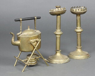 A pair of Benson style brass candlesticks (a/f), 31cm high, an Edwardian embossed brass spirit kettle 32cm 