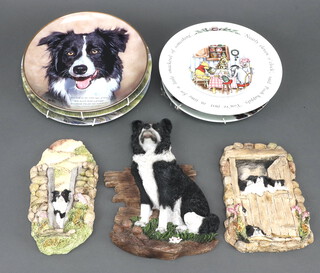 Two composition wall plaques decorated with dogs 