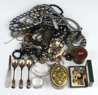 A silver bangle, a napkin ring, 3 teaspoons, a folding fruit knife with silver blade and mother of pearl grip, cufflinks and studs and a collection of vintage costume jewellery 