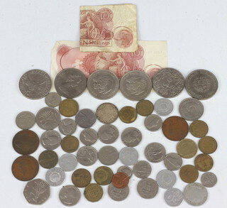 A collection of minor commemorative crowns and coins and 2 ten shilling notes