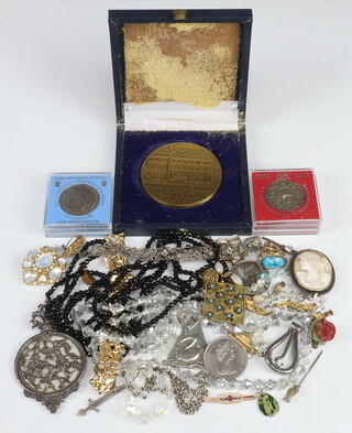 A Baring Brothers cased commemorative coin and minor coins and jewellery 