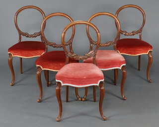 A set of 5 Victorian carved walnut ballon back dining chairs with carved mid rails and overstuffed seats, raised on cabriole supports 89cm x 46cm x 41cm (frames loose) 