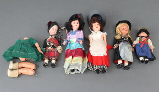 A collection of costume dolls 